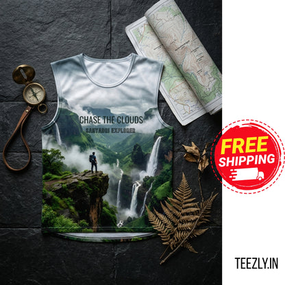 T-shirt with nature design and 'Chase the Clouds' text on a dark surface with maps and compass.