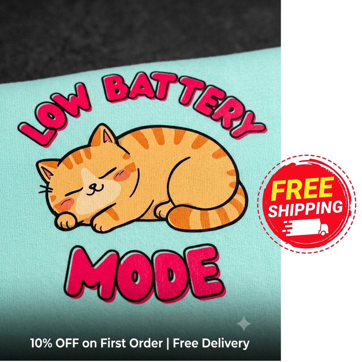 Cartoon cat with 'Low Battery Mode' text on a promotional card with free shipping offer.